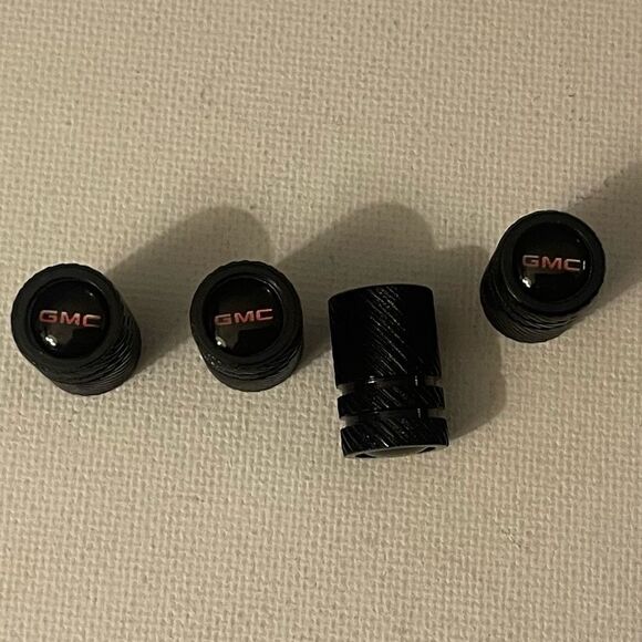 GMC Logo valve Stem caps in Black set of 4 NWT - Picture 1 of 4
